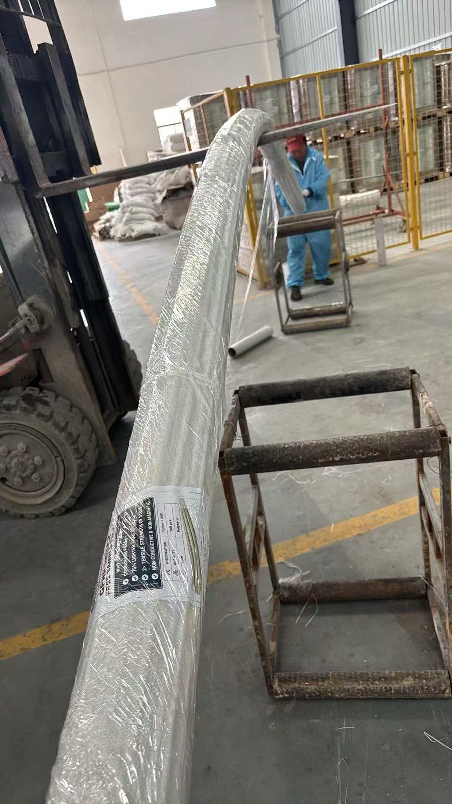 Bundle of GFRP rebar bent to show flexibility